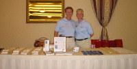 Linda and Deb ready the AllEars.Net table