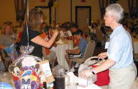 Lisa draws a winning ticket for a Passporter WDW book and Goody bag!