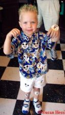 After getting his haircut, Brady decides he wants to wear ALL the stickers at once!